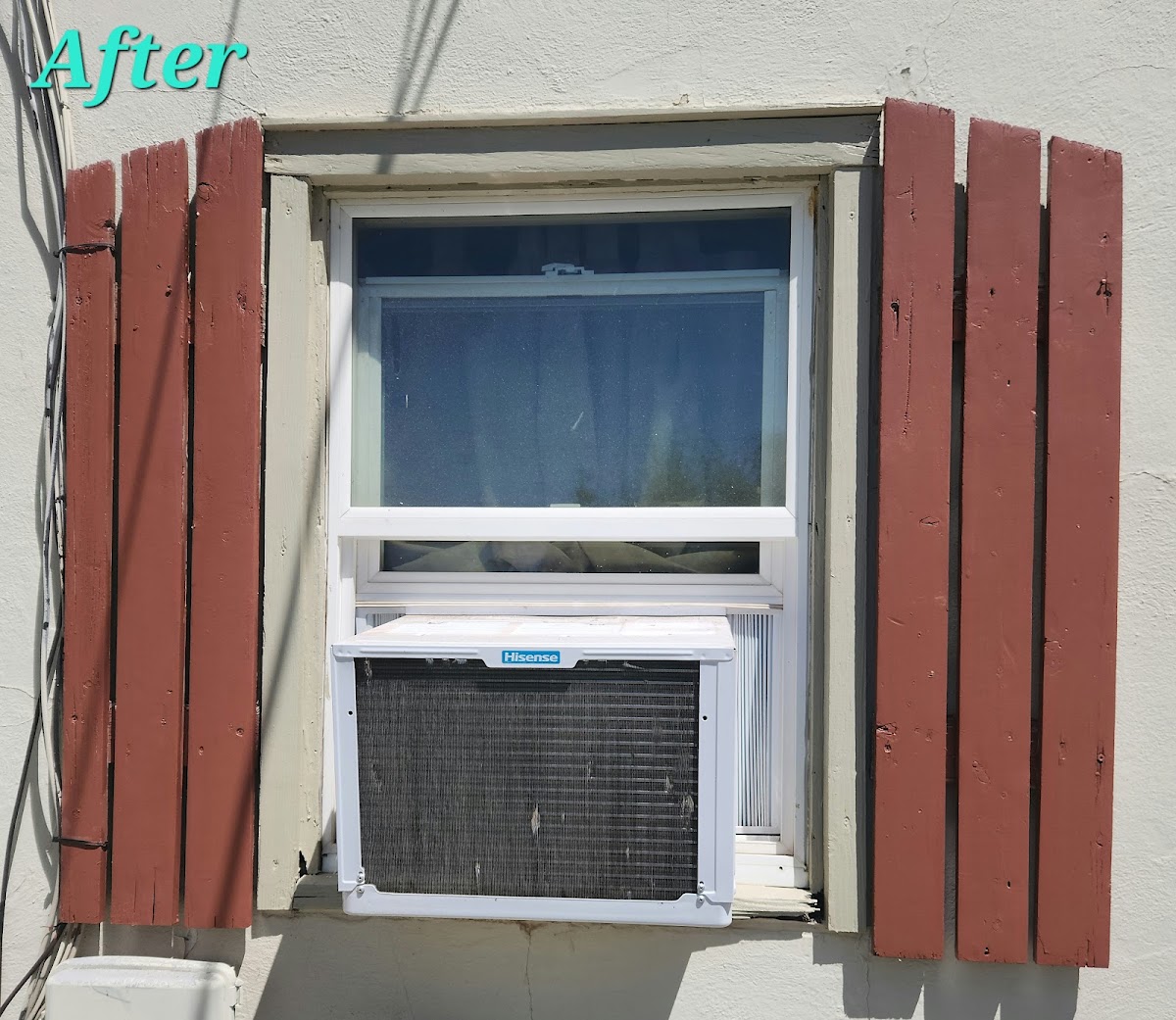 Exterior window with new shutters and trim